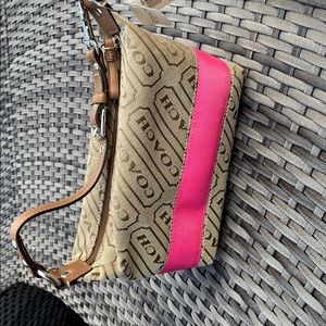 Small coach purse. Brand new with tags